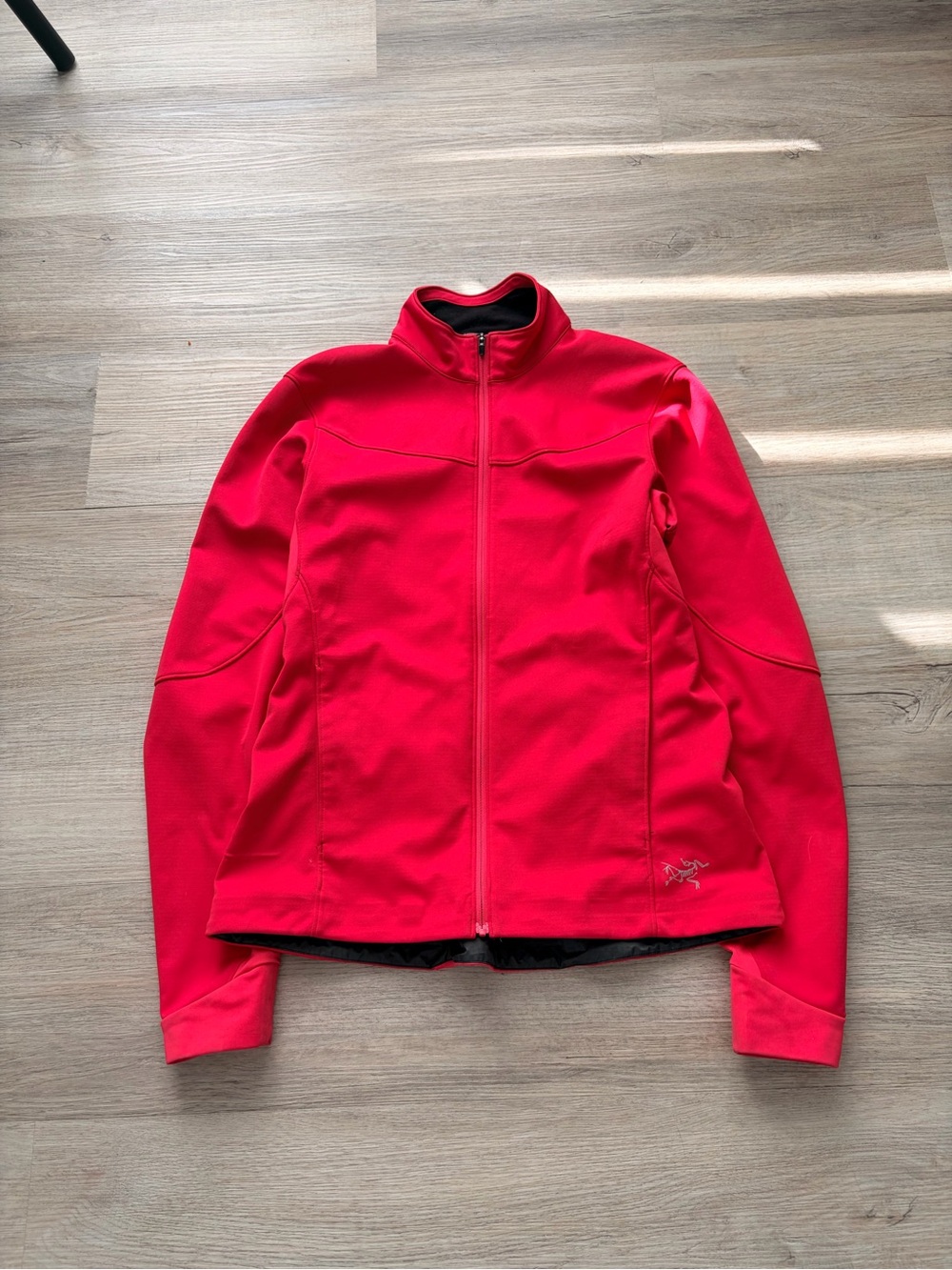 Women’s pink Arc’teryx light windstoper jacket